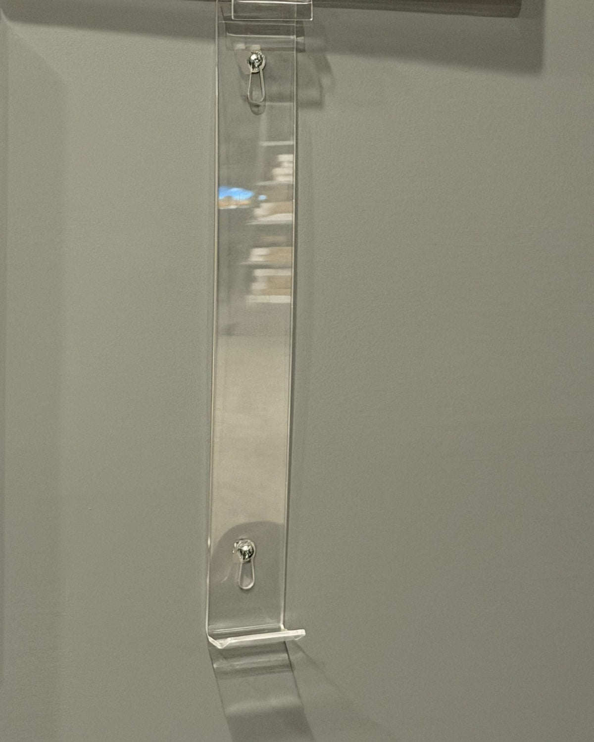 The mount on its own, installed with two screws