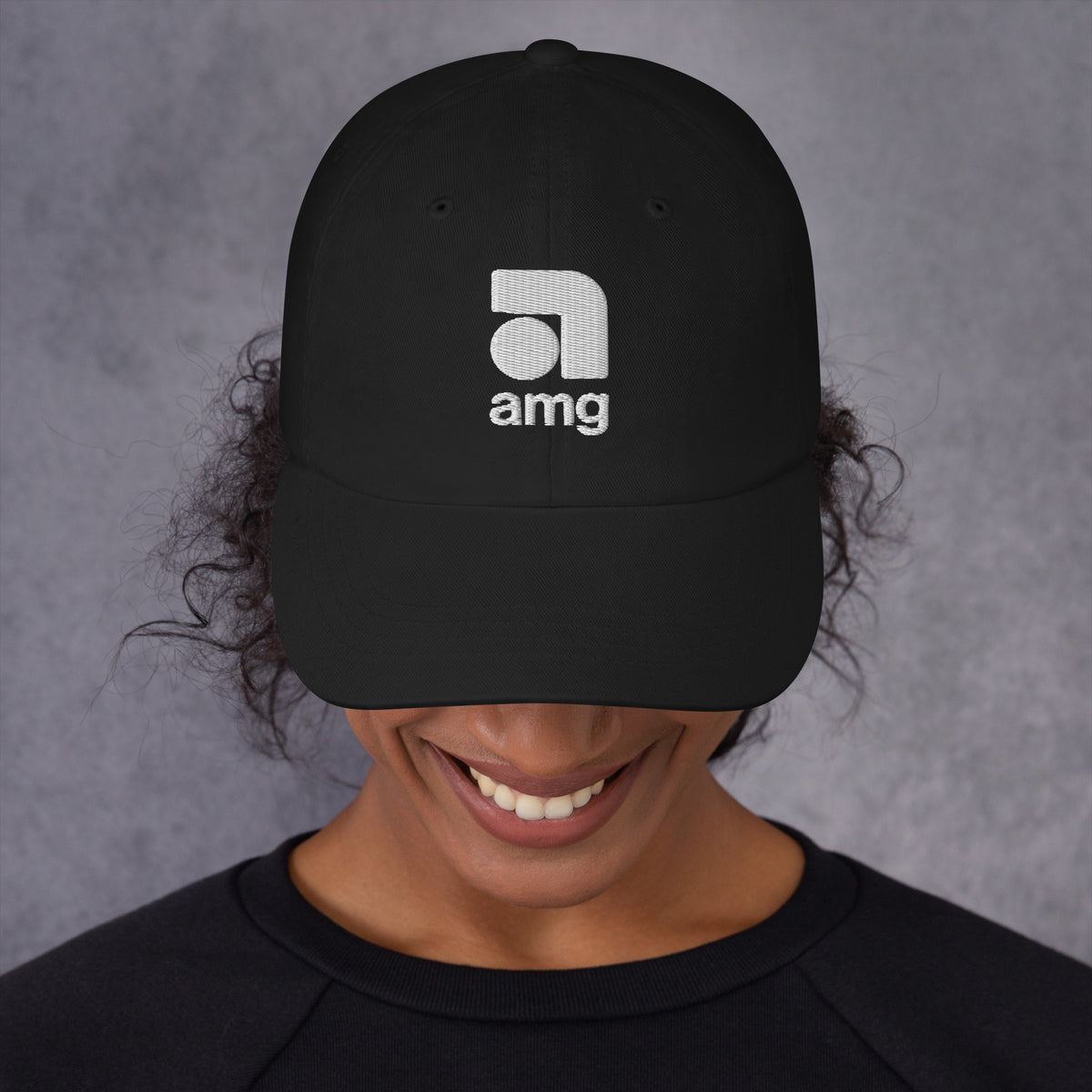 The AMG Dad Hat in black, with the embroidered AMG logo